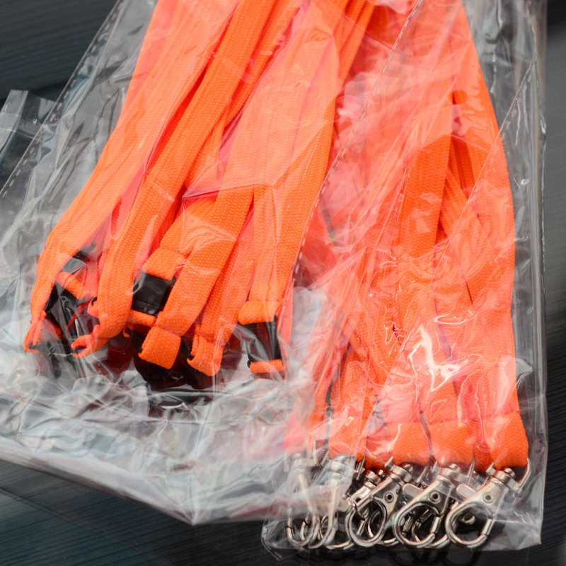 Oranssi Classic 10mm kaulanauha turvalukolla ja papukaijaklipsillä